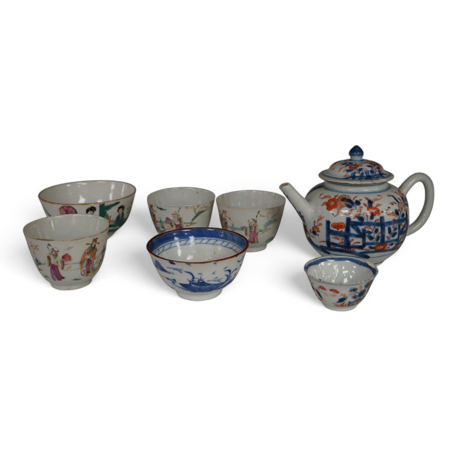 An 18th century Chinese Imari teapot and cover, a similar teabowl, four early 20th century Chinese porcelain cups and a bowl, tallest 12cm. Condition - varies